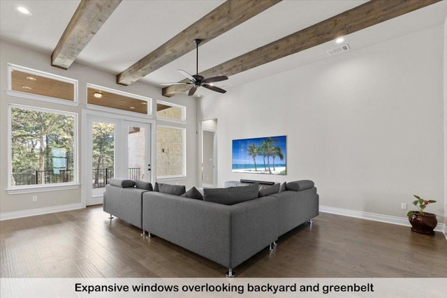 145 Gaston Dr, Bastrop, TX 78602 - living room with french doors, baseboards, dark wood finished floors, and visible vents