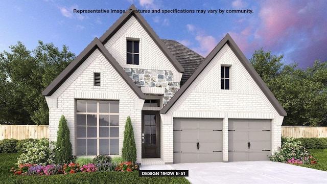 144 Spring Bluff Ln, Georgetown, TX 78628 - view of front of home with brick siding, driveway, and a garage
