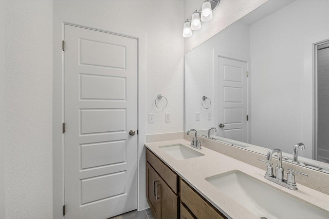1405 S Brook Dr, Leander, TX 78641 - full bathroom featuring double vanity