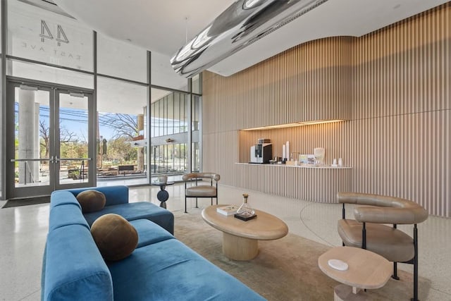 44 E Ave Unit 3402, Austin, TX 78701 - building lobby featuring a high ceiling and a wall of windows