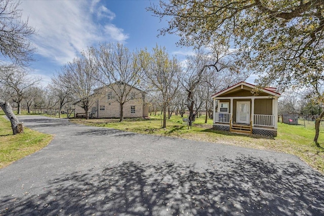 view of asphalt driveway