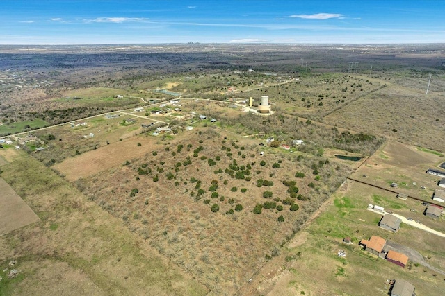 aerial view of property and surrounding area with rural landscape
