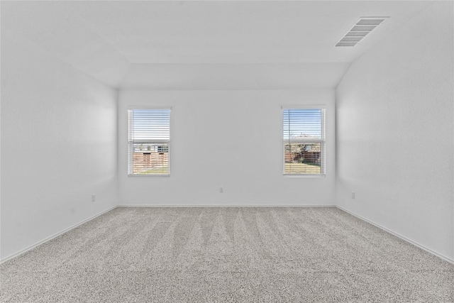 130 Carmello, Kyle, TX 78640 - carpeted empty room featuring healthy amount of natural light and lofted ceiling