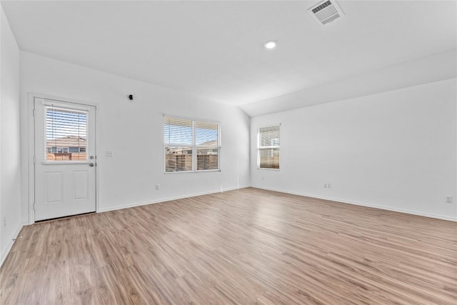 130 Carmello, Kyle, TX 78640 - unfurnished room with light wood-type flooring and recessed lighting