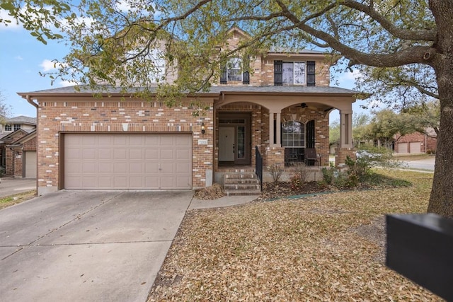 2701 Blackstone Cv, Round Rock, TX 78665 - traditional home featuring a porch, brick siding, driveway, and a garage