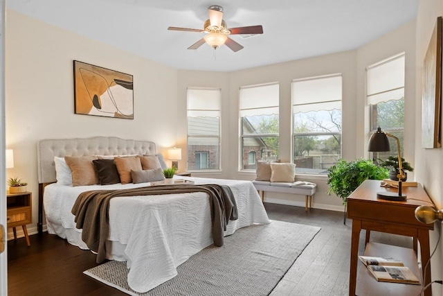 2701 Blackstone Cv, Round Rock, TX 78665 - bedroom featuring hardwood / wood-style flooring, ceiling fan, and baseboards