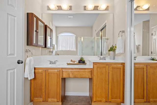 2701 Blackstone Cv, Round Rock, TX 78665 - full bathroom with double vanity, a shower stall, and tile patterned floors