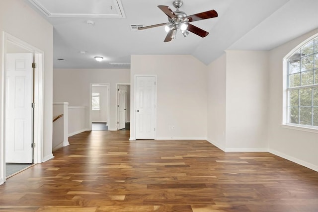 2701 Blackstone Cv, Round Rock, TX 78665 - empty room featuring attic access, a ceiling fan, wood finished floors, baseboards, and lofted ceiling