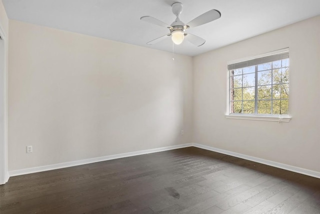 2701 Blackstone Cv, Round Rock, TX 78665 - spare room featuring dark wood-style floors, baseboards, and ceiling fan