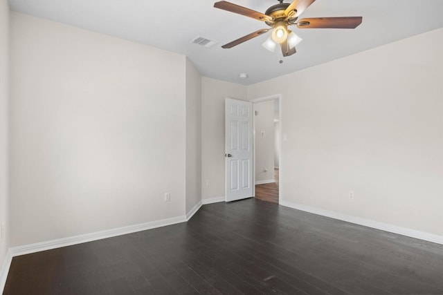 2701 Blackstone Cv, Round Rock, TX 78665 - spare room with dark wood finished floors, baseboards, and ceiling fan