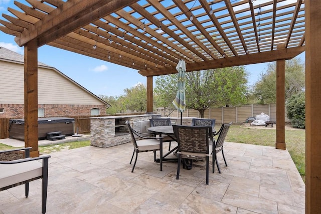 2701 Blackstone Cv, Round Rock, TX 78665 - fenced backyard with a hot tub, a patio area, outdoor dining area, a pergola, and exterior kitchen