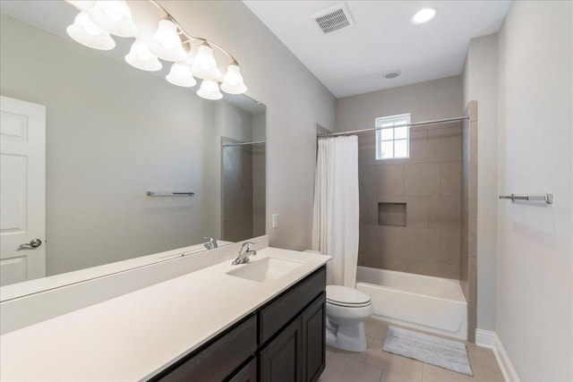 9003 Jodie Ln, Austin, TX 78748 - full bathroom with vanity, toilet, tile patterned floors, shower / bath combo with shower curtain, and baseboards