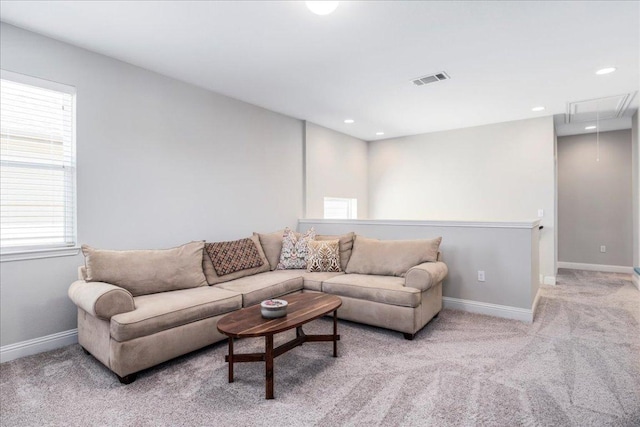 9003 Jodie Ln, Austin, TX 78748 - living area with attic access, light colored carpet, plenty of natural light, baseboards, and recessed lighting