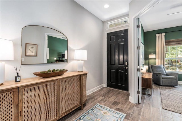 9003 Jodie Ln, Austin, TX 78748 - entryway featuring wood finished floors, baseboards, lofted ceiling, and recessed lighting