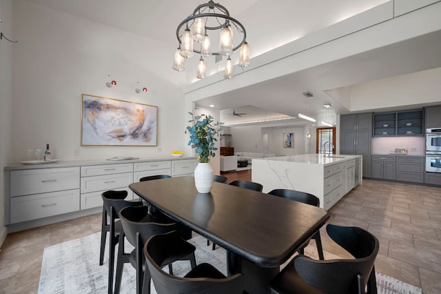 7603 Rustling Cv, Austin, TX 78731 - dining room with a chandelier