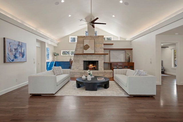 7603 Rustling Cv, Austin, TX 78731 - living room with ceiling fan, a stone fireplace, wood finished floors, recessed lighting, and high vaulted ceiling