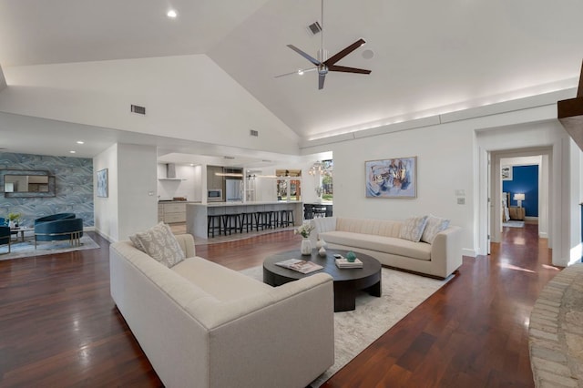 7603 Rustling Cv, Austin, TX 78731 - living room with a ceiling fan, wood finished floors, and high vaulted ceiling