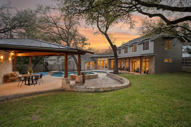 7603 Rustling Cv, Austin, TX 78731 - fenced backyard with a gazebo, a patio area, and a pool with connected hot tub