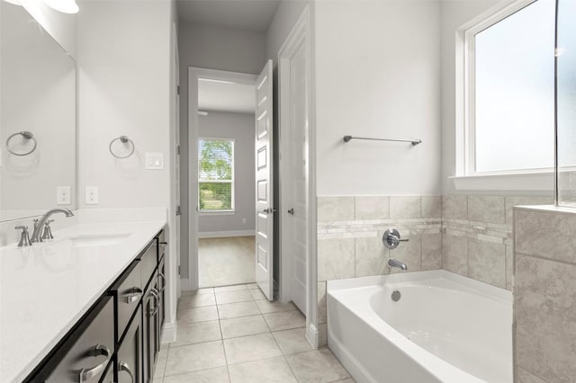 600 C-Bar Ranch Trl Unit 116, Cedar Park, TX 78613 - bathroom featuring vanity, a garden tub, and tile patterned flooring