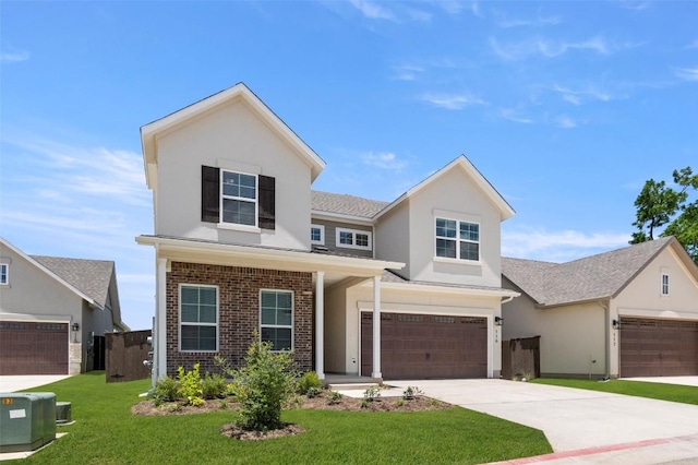 600 C-Bar Ranch Trl Unit 116, Cedar Park, TX 78613 - traditional-style house featuring stucco siding, a front lawn, concrete driveway, and a garage