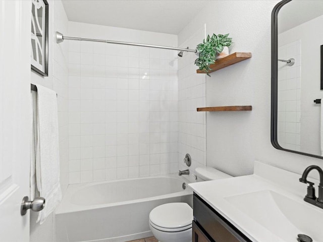 full bathroom featuring vanity, shower / bathing tub combination, and toilet