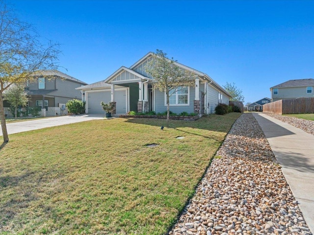 view of front of house with a front yard, an attached garage, board and batten siding, fence, and driveway