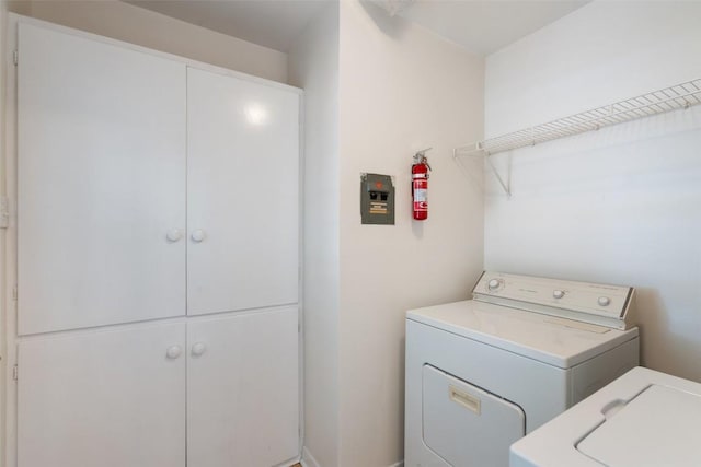 2708 W 49th St W, Austin, TX 78731 - laundry area with washer / clothes dryer and cabinet space