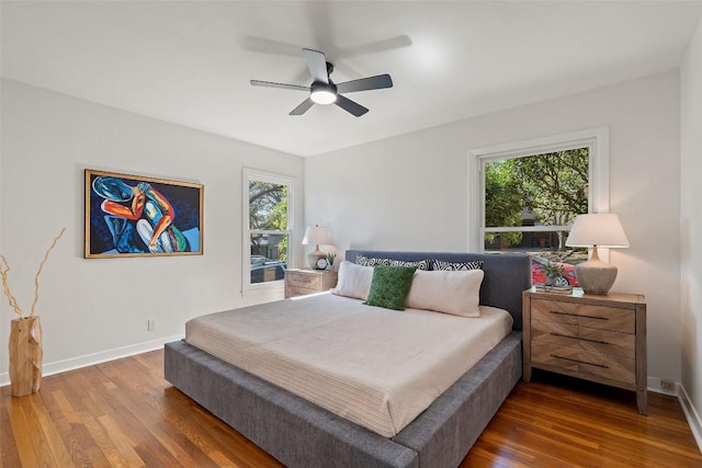 2708 W 49th St W, Austin, TX 78731 - bedroom featuring wood finished floors, baseboards, and ceiling fan