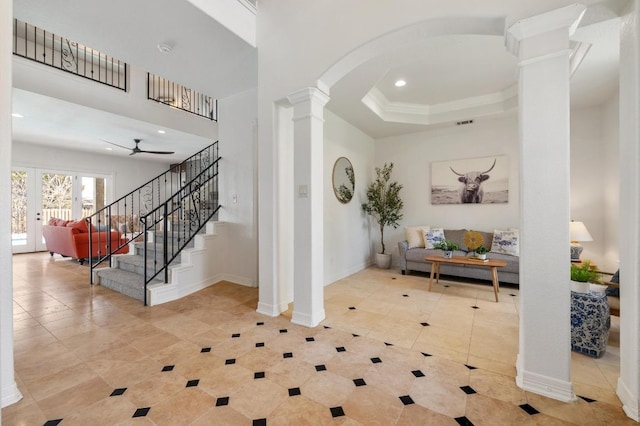 503 Eagle, Lakeway, TX 78734 - entryway with ornate columns, tile patterned flooring, a ceiling fan, arched walkways, and recessed lighting