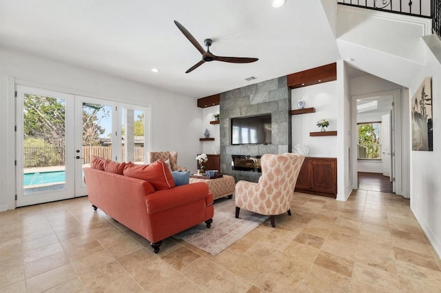 503 Eagle, Lakeway, TX 78734 - living room featuring healthy amount of natural light, a ceiling fan, recessed lighting, french doors, and baseboards