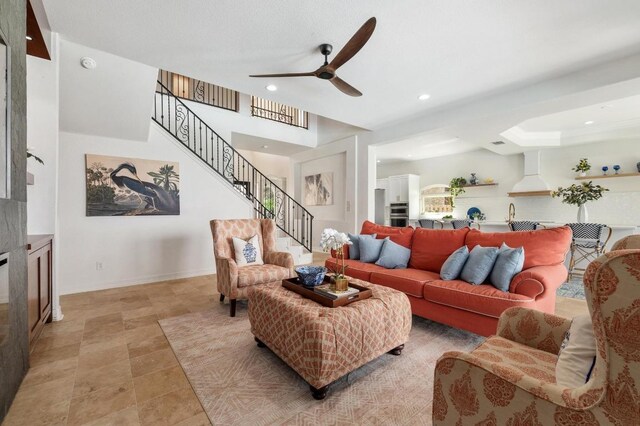 503 Eagle, Lakeway, TX 78734 - living area featuring stairs, ceiling fan, recessed lighting, and baseboards