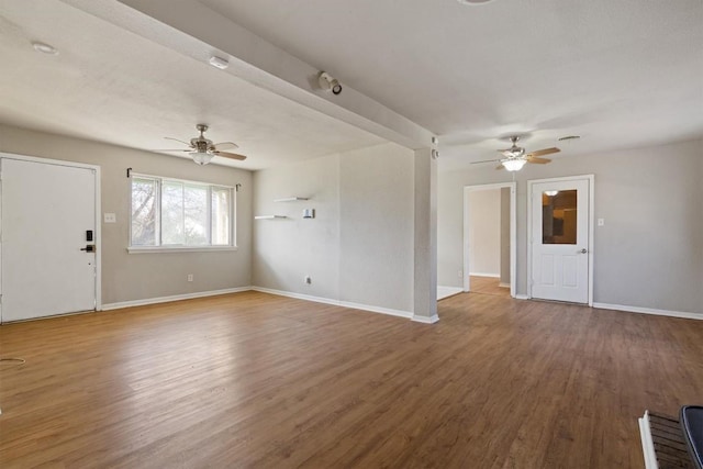 703 S 13th St, Copperas Cove, TX 76522 - unfurnished living room featuring a ceiling fan and wood finished floors