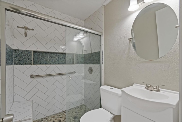 703 S 13th St, Copperas Cove, TX 76522 - full bath featuring vanity, a shower stall, and a textured wall