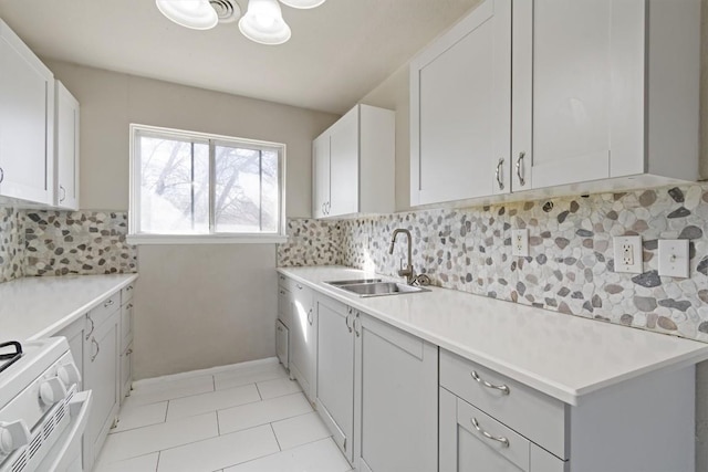 703 S 13th St, Copperas Cove, TX 76522 - laundry room featuring light tile patterned floors and baseboards