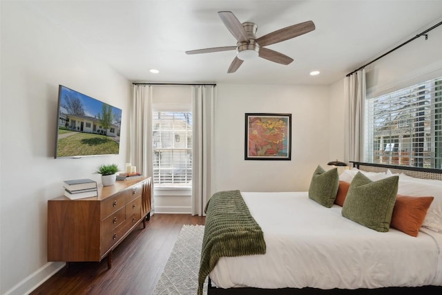 1213 S Church St, Georgetown, TX 78626 - bedroom with dark wood finished floors, baseboards, recessed lighting, and a ceiling fan