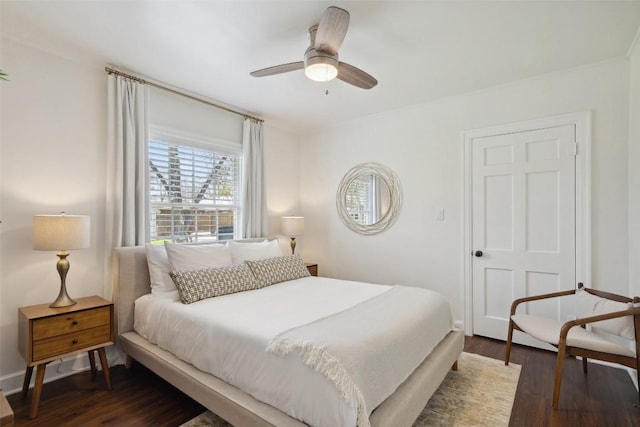 1213 S Church St, Georgetown, TX 78626 - bedroom with wood finished floors and ceiling fan