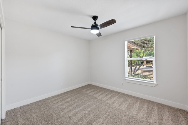 125 Chaparral St, San Marcos, TX 78666 - empty room with light carpet, baseboards, and a ceiling fan