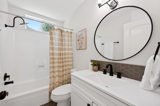 125 Chaparral St, San Marcos, TX 78666 - full bathroom featuring tasteful backsplash, toilet, shower / tub combo, and vanity