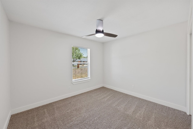 125 Chaparral St, San Marcos, TX 78666 - carpeted empty room with a ceiling fan and baseboards