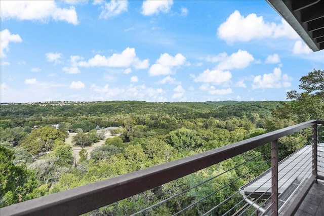 1002 Arroweye Trl, Austin, TX 78733 - balcony featuring a wooded view