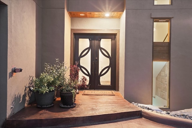 1002 Arroweye Trl, Austin, TX 78733 - entrance to property featuring french doors and stucco siding