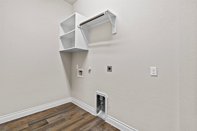 laundry room featuring dark wood-style flooring, gas dryer hookup, hookup for a washing machine, laundry area, and hookup for an electric dryer