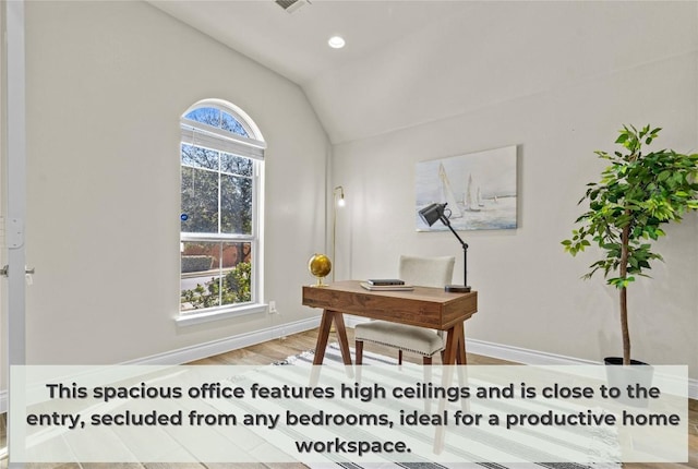 office area featuring baseboards, lofted ceiling, wood finished floors, and recessed lighting