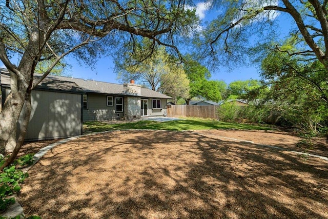 view of yard featuring fence