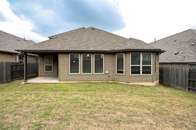 908 Leadtree Loop, Buda, TX 78610 - back of house with a patio