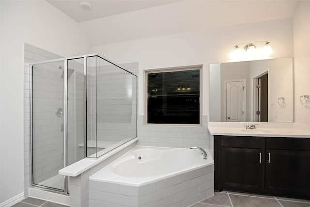908 Leadtree Loop, Buda, TX 78610 - bathroom featuring vanity, a garden tub, a stall shower, and tile patterned flooring