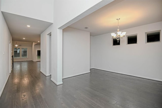 908 Leadtree Loop, Buda, TX 78610 - empty room with dark wood-type flooring, a chandelier, baseboards, recessed lighting, and ceiling fan
