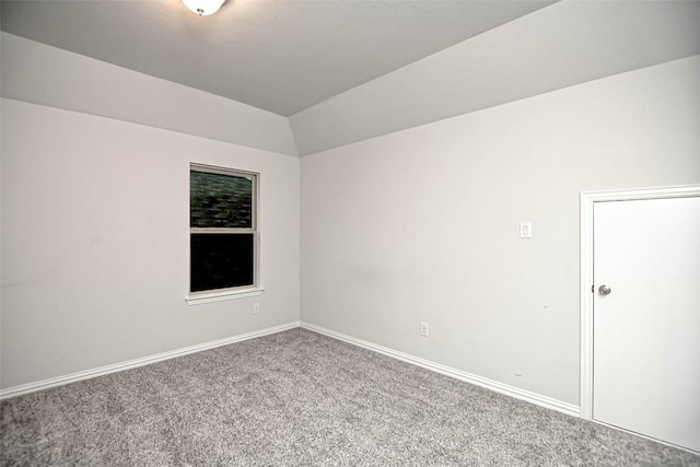908 Leadtree Loop, Buda, TX 78610 - carpeted spare room featuring vaulted ceiling and baseboards