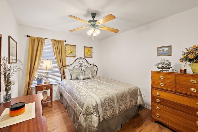 3919 Haleys Way, Round Rock, TX 78665 - bedroom featuring wood finished floors, baseboards, and ceiling fan