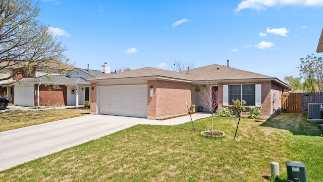 3919 Haleys Way, Round Rock, TX 78665 - ranch-style home featuring brick siding, an attached garage, cooling unit, and driveway